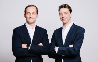 Paul Resch (CEO) standing next to Alexander Lachinger (CMO)